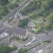 Oblique aerial view of Dean Parish Church and Bristo Baptist Church, looking SW.