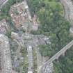 Oblique aerial view of Dean Village, Damside, Dean Path, Dean Bridge, Rothesay Terrace, Belgrave Terrace and Holy Trinity Espicopal Church, looking WNW.