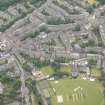 Oblique aerial view of Comely Bank Road, looking S.