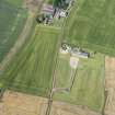 Oblique aerial view of the cropmarks of the field boundaries, looking WSW.