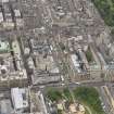 Oblique aerial view of South St David Street, George Street, Princes Street and Jenners Department Store, looking WSW.