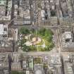 Oblique aerial view of South St Andrew Street, Princes Street, the Scottish National Portrait Gallery and St Andrew Square, looking WSW.