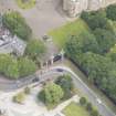 Oblique aerial view of Holyrood Palace Yard House and South Gateway, looking N.
