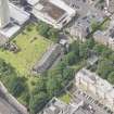 Oblique aerial view of Trinity House and South Leith Parish Church and Churchyard, looking WSW.
