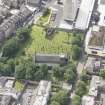 Oblique aerial view of Trinity House and South Leith Parish Church and Churchyard, looking S.