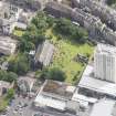 Oblique aerial view of Trinity House and South Leith Parish Church and Churchyard, looking ENE.