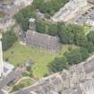 Oblique aerial view of Trinity House and South Leith Parish Church and Churchyard, looking NNW.