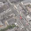 Oblique aerial view of St John's East Church, Bank of Scotland, 31-33 Queen Charlotte Street, 41 Queen Charlotte Street, 75-79 Constitution Street and 35-39 Queen Charlotte Street, looking SW.