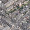 Oblique aerial view of St John's East Church, Bank of Scotland, 31-33 Queen Charlotte Street, 41 Queen Charlotte Street, 75-79 Constitution Street and 35-39 Queen Charlotte Street, looking E.