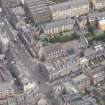 Oblique aerial view of St John's East Church and Bank of Scotland, looking NE.