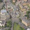 Oblique aerial view of St Thomas' Church and Leith Hospital, looking WNW.