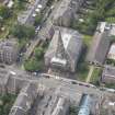 Oblique aerial view of North Leith Parish Church, Church hall and Beadle's House, looking SW.