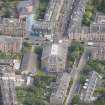 Oblique aerial view of North Leith Parish Church, Church hall and Beadle's House, looking NNE.