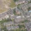 Oblique aerial view of North Leith Parish Church, Church hall and Beadle's House, looking NNW.