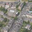 Oblique aerial view of North Leith Parish Church, Church hall and Beadle's House, looking WNW.