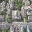 Oblique aerial view of North Leith Parish Church, Church hall and Beadle's House, looking SW.