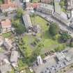 Oblique aerial view of St Triduana's Chapel, Restalrig Parish Church and Churchyard, looking E.