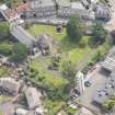 Oblique aerial view of St Triduana's Chapel, Restalrig Parish Church and Churchyard, looking ESE.
