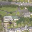  Oblique aerial view of the Roman Catholic Church of St Ninian and St Triduana and 232 Marionville Road, looking WNW.