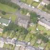 Oblique aerial view of the Roman Catholic Church of St Ninian and St Triduana and 232 Marionville Road, looking NW.