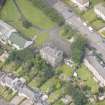 Oblique aerial view of the Roman Catholic Church of St Ninian and St Triduana and 232 Marionville Road, looking WNW.