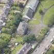 Oblique aerial view of the Roman Catholic Church of St Ninian and St Triduana and 232 Marionville Road, looking WSW.