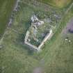 Oblique aerial view of Inverallochy Castle, looking NE.