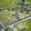 Oblique aerial view of Hill Church of Rosehearty, Old Pitsligo Church and Churchyard, looking SE.