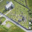 Oblique aerial view of Hill Church of Rosehearty, Old Pitsligo Church and Churchyard, looking E.