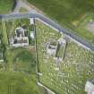 Oblique aerial view of Hill Church of Rosehearty, Old Pitsligo Church and Churchyard, looking W.
