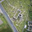 Oblique aerial view of Old Pitsligo Church and Churchyard, looking NE.