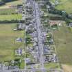 Oblique aerial view of New Aberdour, looking S.