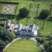 Oblique aerial view of Pitmedden House, looking E.