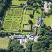 Oblique aerial view of Pitmedden House and walled garden, looking S.