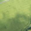 Oblique aerial view of the cropmarks of the entrance on the NW side of the Roman Temporary Camp, looking WSW.