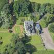 Oblique aerial view of Kirknewton House, looking WSW.