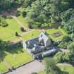 Oblique aerial view of Kirknewton House, looking S.