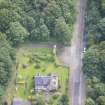 Oblique aerial view of Hatton House south entrance gates, looking ENE.