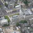 Oblique aerial view of Nicolson Square Methodist Chapel, University Student's Union, Central Mosque and the Informatics Forum Building, looking E.