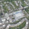 Oblique aerial view of Merchiston Castle and Napier University, looking S.