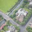Oblique aerial view of Polwarth Parish Church and Harrison Road Bridge, looking N.