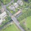 Oblique aerial view of Polwarth Parish Church and Harrison Road Bridge, looking S.