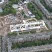 Oblique aerial view of James Gillespie's High School, Bruntsfield House and Lauderdale Street, looking W.