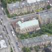 Oblique aerial view of St Peter's Roman Catholic Church and Presbytery, looking SSW.