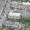 Oblique aerial view of St Peter's Roman Catholic Church and Presbytery, looking S.