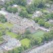 Oblique aerial view of Gillis College and St Margaret's Convent, looking SW.