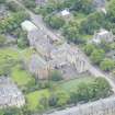 Oblique aerial view of Gillis College and St Margaret's Convent, looking SSW.