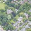 Oblique aerial view of The Lane House and Egremont House, looking SW.