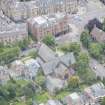 Oblique aerial view of St Matthew's Parish Church and Morningside South United Free Church, looking WNW.