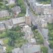 Oblique aerial view of Morningside South United Free Church, looking SSW.